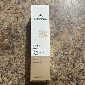 Arbonne FunSun Tinted Self-Tanning Lotion - White and Tan